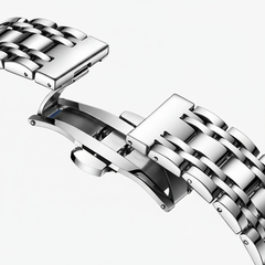 Close-up of a silver metal watch strap on a white background