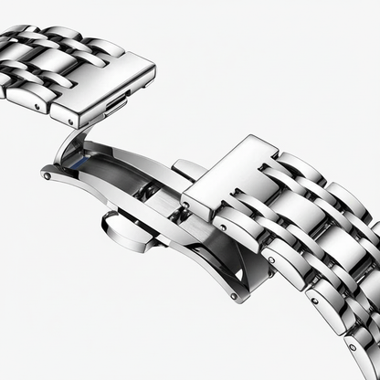 Close-up of a silver metal watch strap on a white background