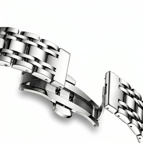 Close-up of a silver metal bracelet on a white background
