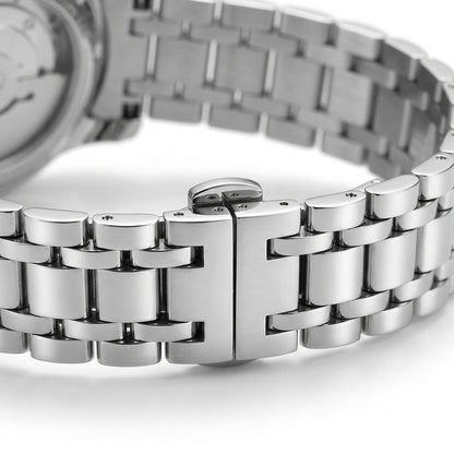 Close-up of a silver metal watch band on a white background