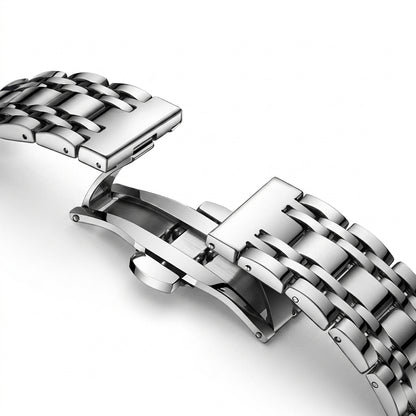 Close-up of a silver metal watch strap on a white background