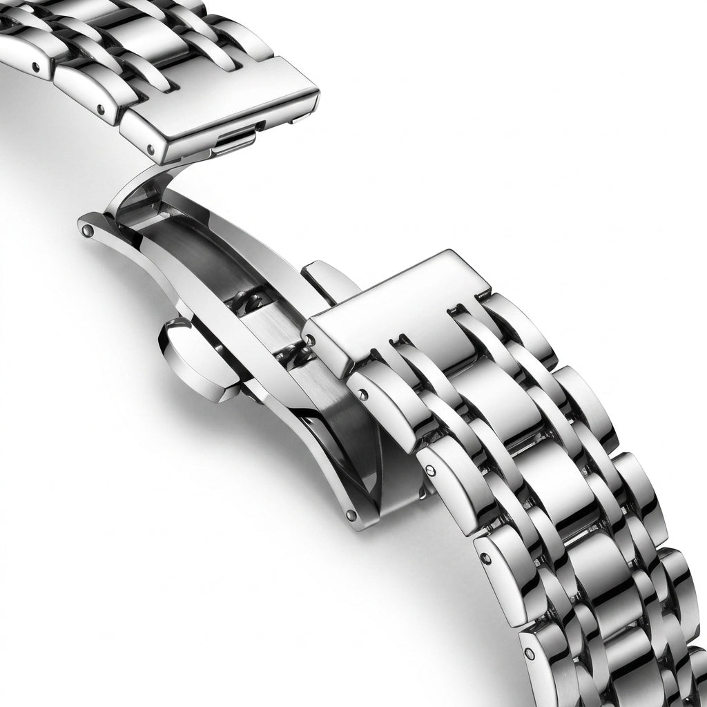 Close-up of a silver metal watch strap on a white background