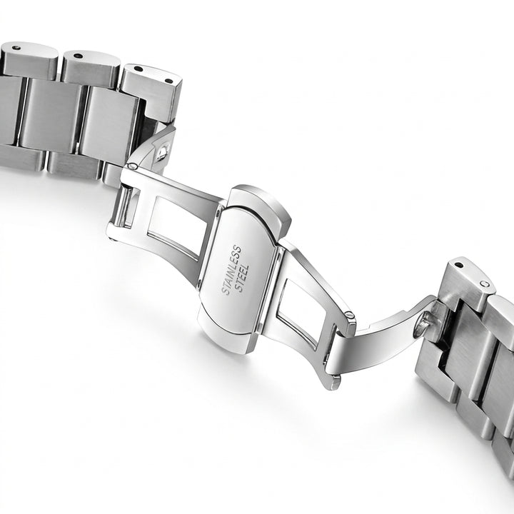 Close-up of a silver metal watch strap on a white background