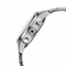 Close-up of a silver watch with a white background