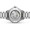 Close-up of a silver watch with visible mechanical components on a white background