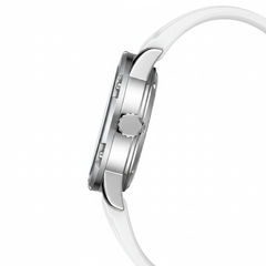Close-up of a silver watch with a white strap on a white background