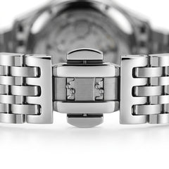 Close-up of a silver watch band and clasp on a white background