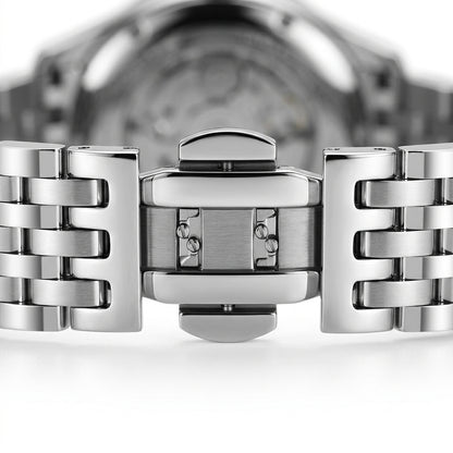 Close-up of a silver watch band and clasp on a white background