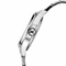 Close-up of a silver watch band on a white background