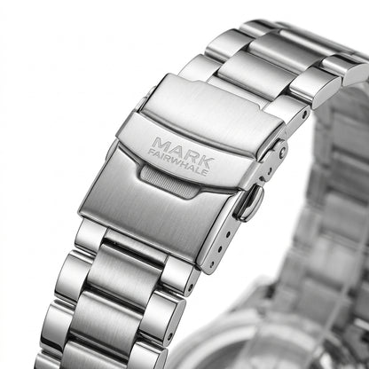 Close-up of a silver watch band with &