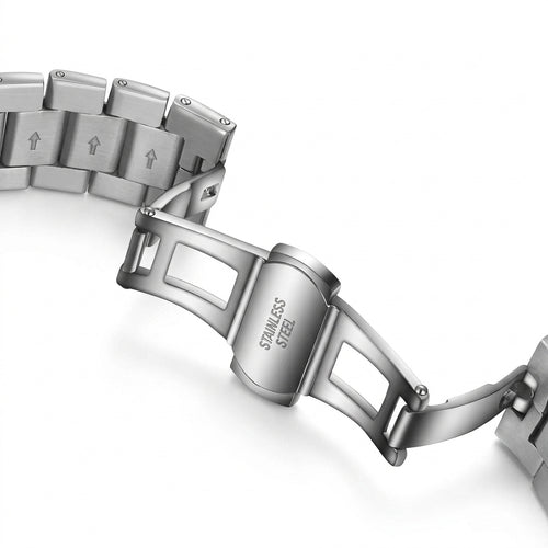 Close-up of a silver watch bracelet with &