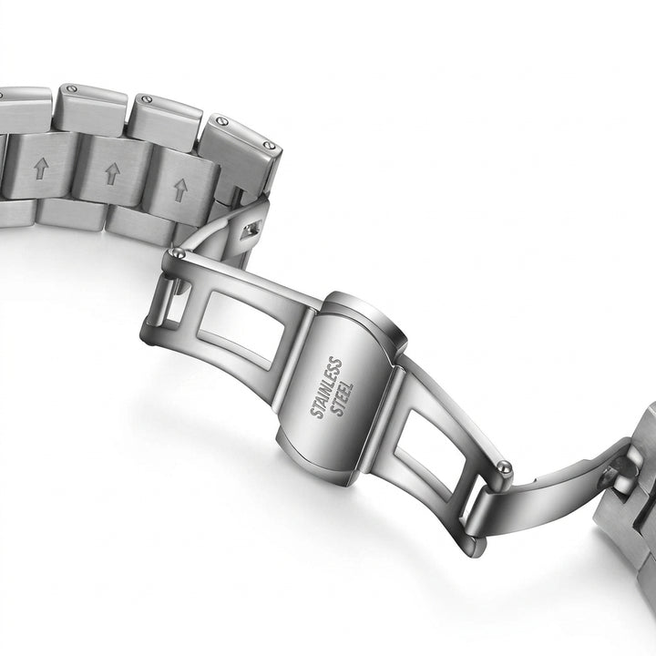 Close-up of a silver watch bracelet with &