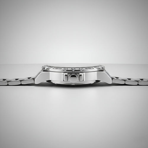 Close-up of a silver watch on a light gray background