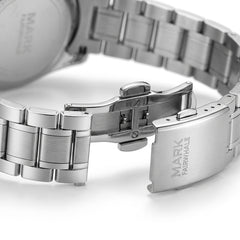 Close-up of a silver watch with a visible brand name on a white background