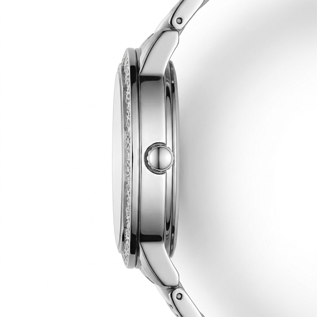 Close-up of a silver watch with a white background