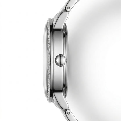 Close-up of a silver watch with a white background