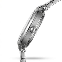 Close-up of a silver watch with a white background