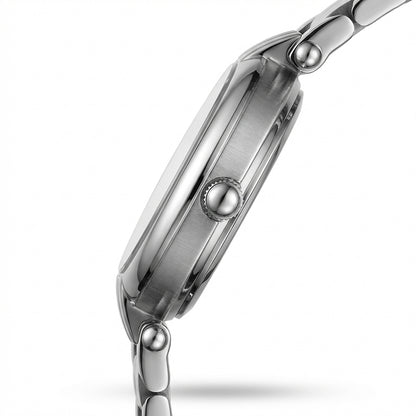 Close-up of a silver watch with a white background