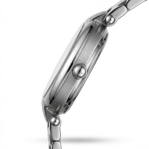 Close-up of a silver watch with a white background