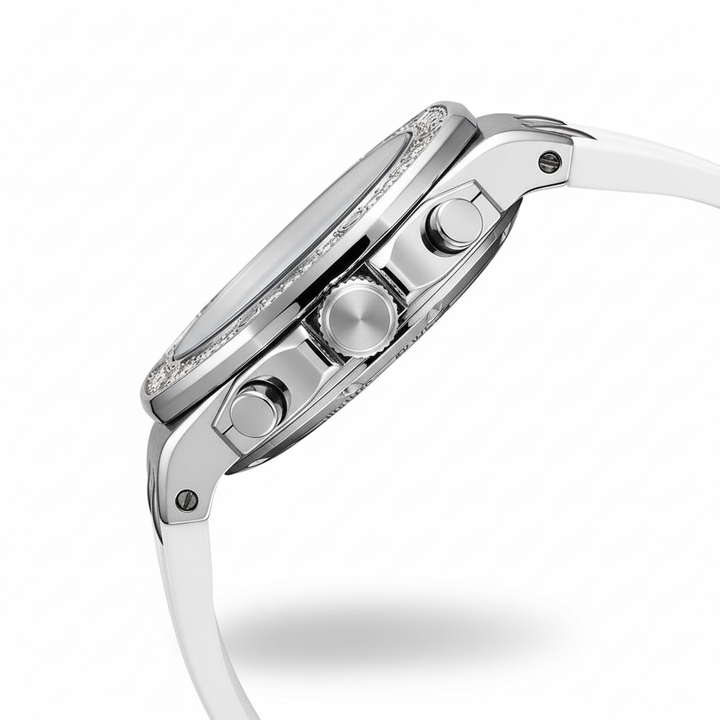 Close-up of a silver watch with a white strap on a white background