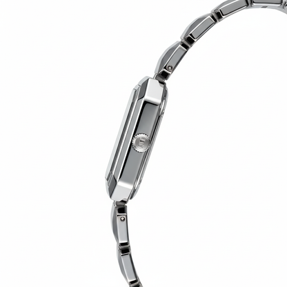 Close-up of a silver watch with a white background