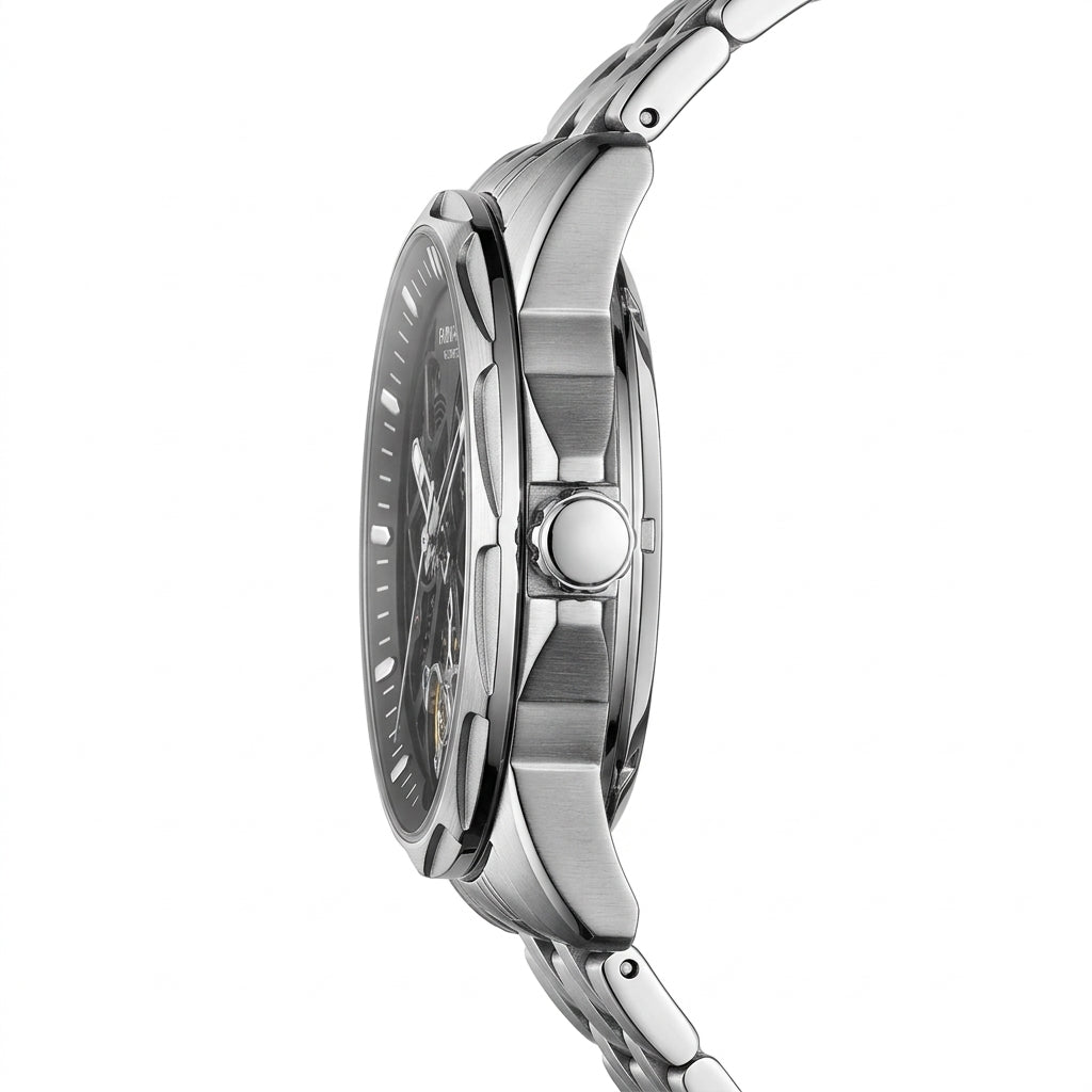 Close-up of a silver watch with detailed case and bracelet on a white background