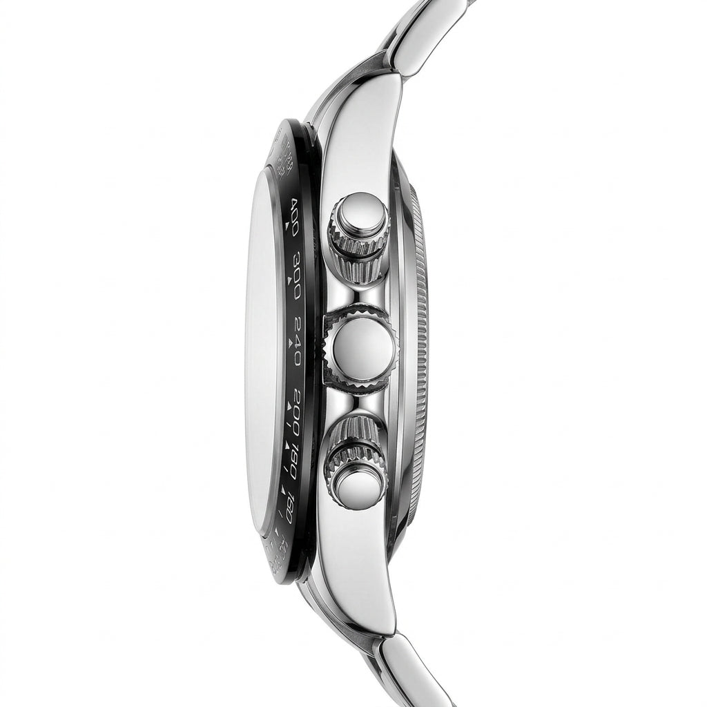 Close-up of a silver watch with detailed case design on a white background