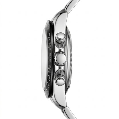 Close-up of a silver watch with detailed case design on a white background