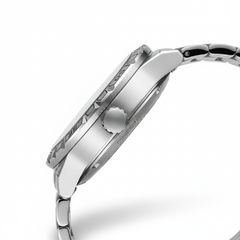 Close-up of a silver watch with detailed design on a white background