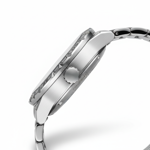 Close-up of a silver watch with detailed design on a white background