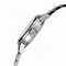 Close-up of a silver watch with a white background