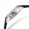 Close-up of a watch with a black strap and silver case on a white background