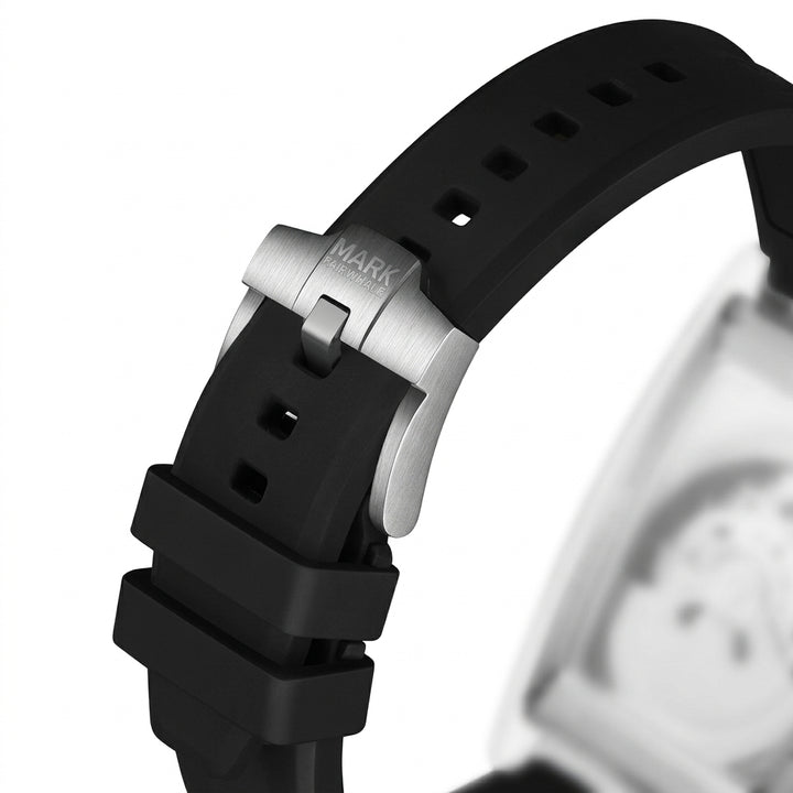 Close-up of a watch with a black strap and silver clasp on a white background