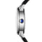 Close-up of a watch with a blue gemstone on a white background