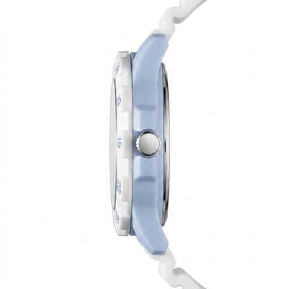 Close-up of a watch with a light blue strap and silver case on a white background