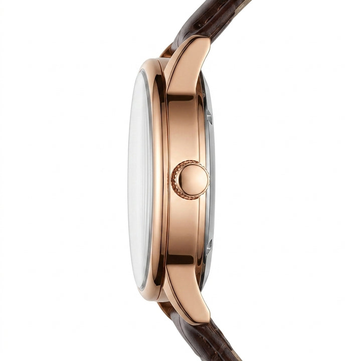 Close-up of a watch with a rose gold case and brown strap on a white background