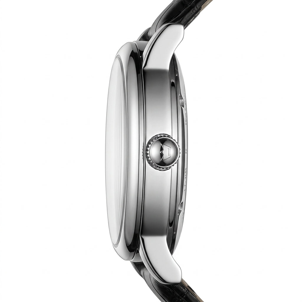 Close-up of a watch with a silver case and black strap on a white background