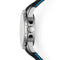 Close-up of a watch with a white face and black strap on a white background