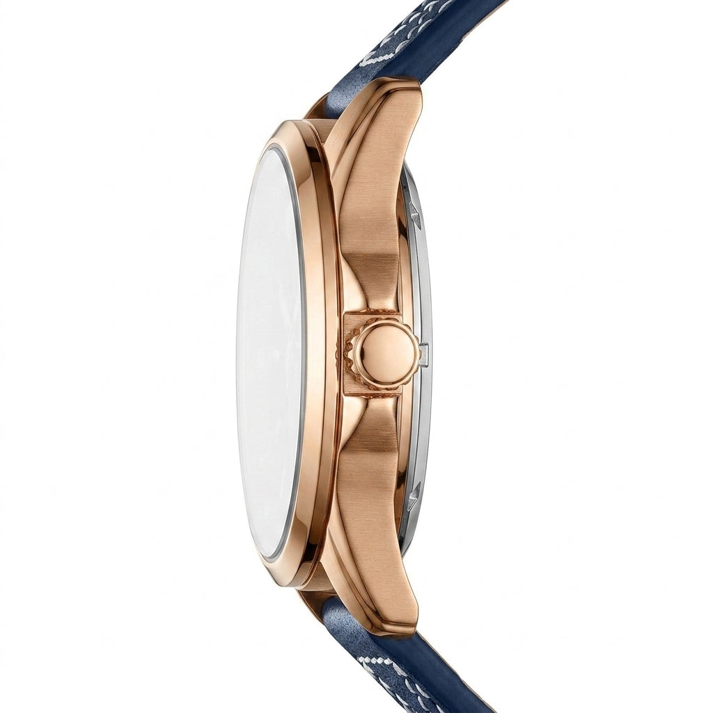 Close-up of a watch with rose gold case and blue strap on a white background