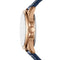 Close-up of a watch with rose gold case and blue strap on a white background