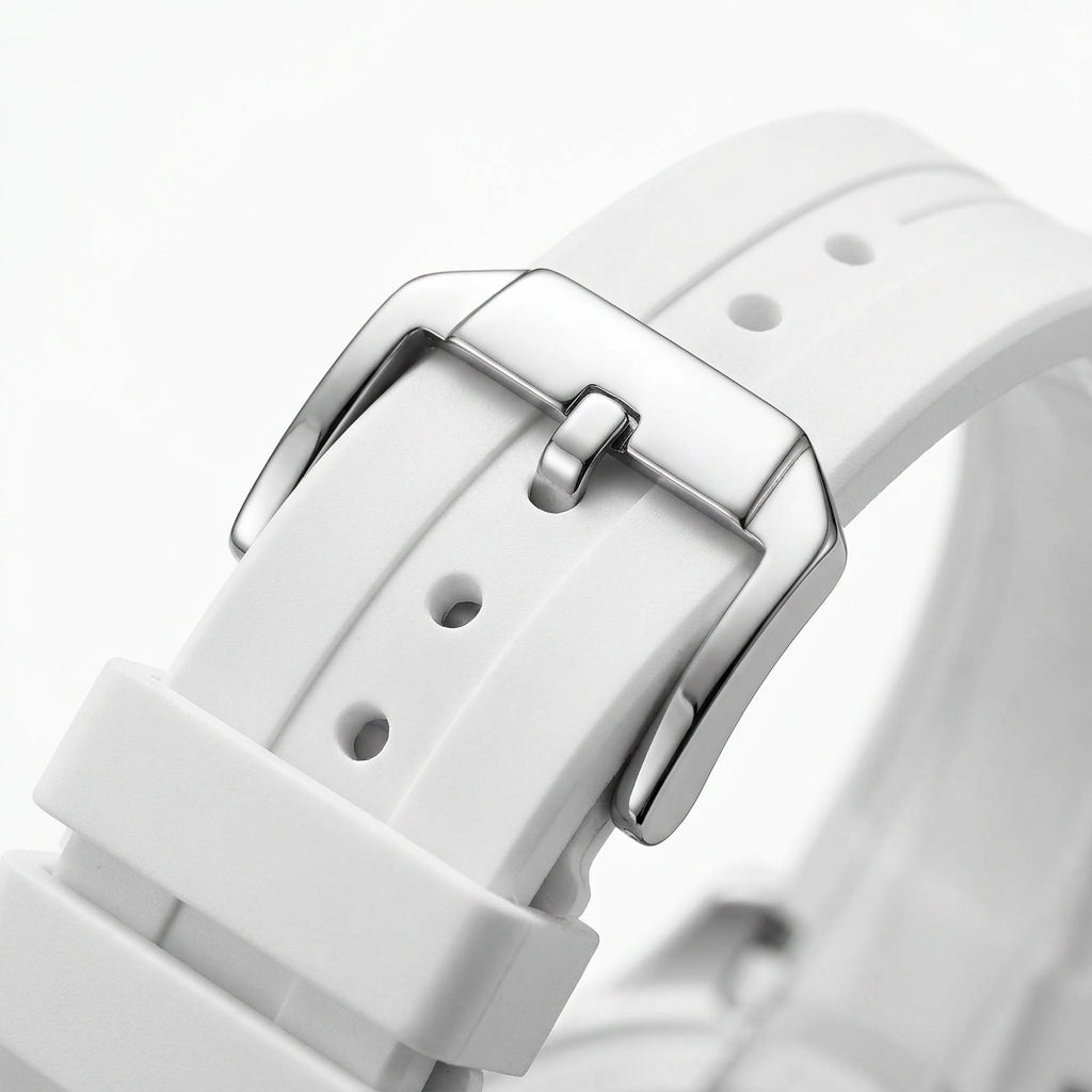Close-up of a white watch strap with a silver buckle on a light gray background