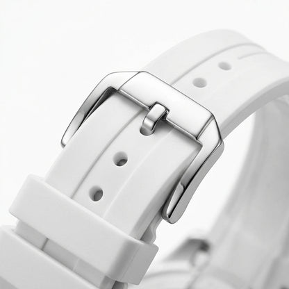 Close-up of a white watch strap with a silver buckle on a light gray background