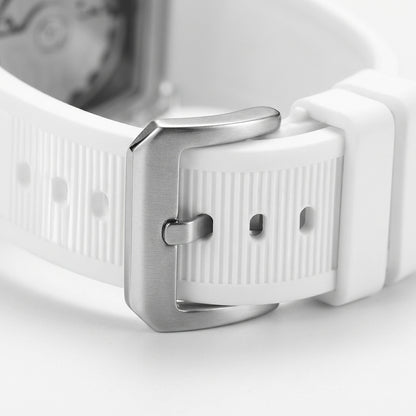 Close-up of a white watch strap with silver buckle on a light gray background