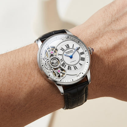 Close-up of a wrist wearing a black wristwatch with a visible brand name.