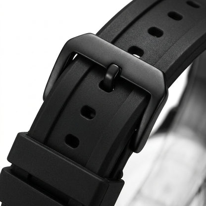 Close-up of a black watch strap with buckle on a white background