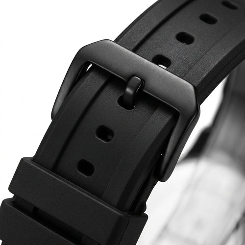 Close-up of a black watch strap with buckle on a white background