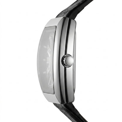 Close-up of a silver watch with a black strap on a white background