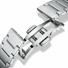 Close-up ofa a silver watch band on a white background