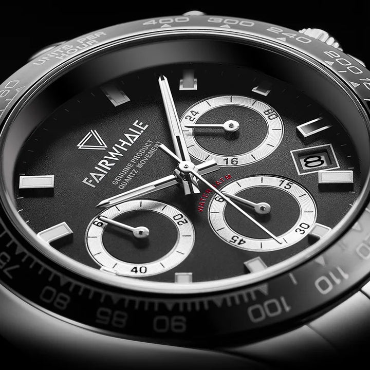 Detail shot of Mark Fairwhale ORIONIS chronograph dial with auto date and luminous hands