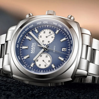 Detailed shot of Mark Fairwhale AURIXON with brushed stainless steel strap and polished bezel.